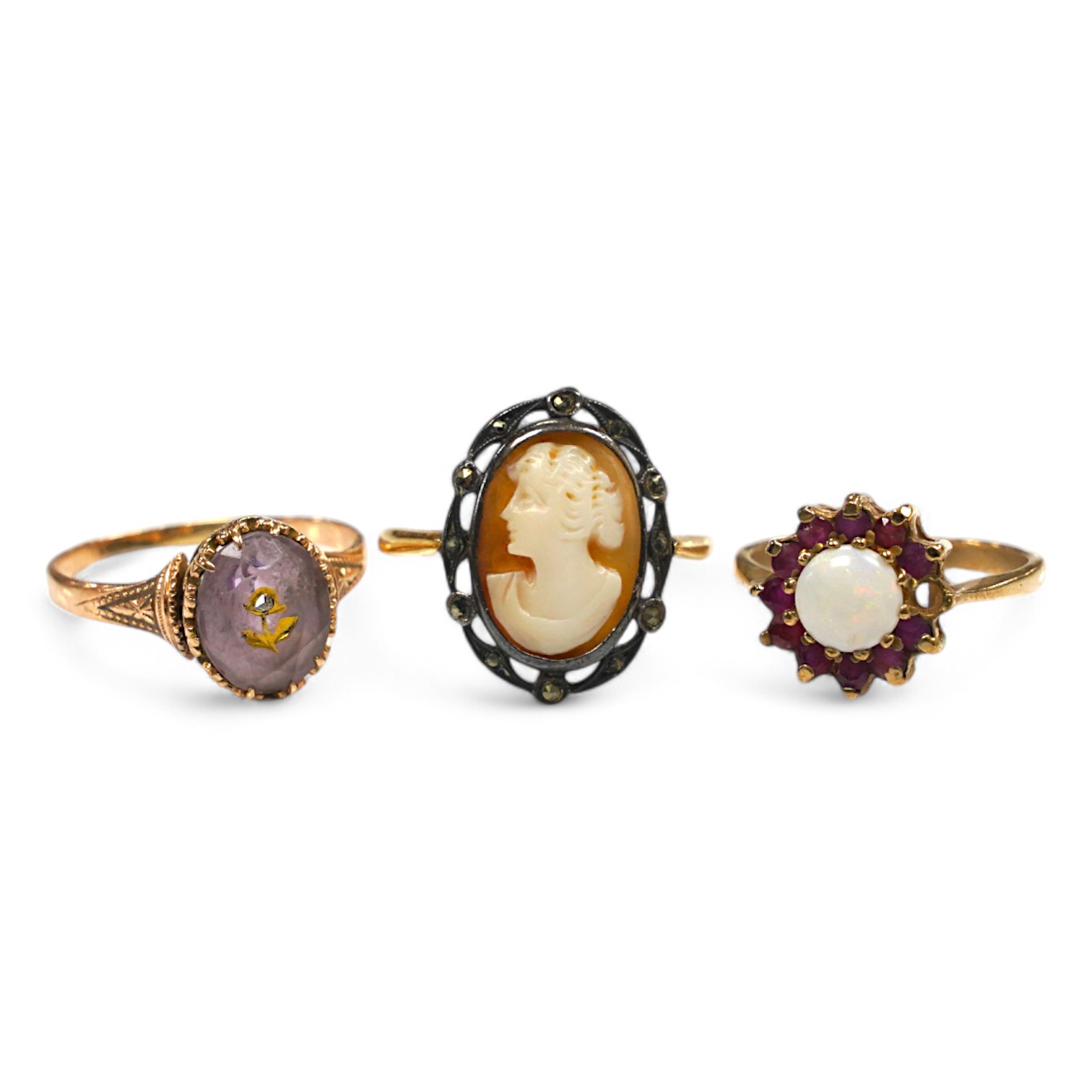 A late Victorian yellow metal amethyst and diamond chip set 'flower' ring, size P and two other rings. Condition - poor to fair